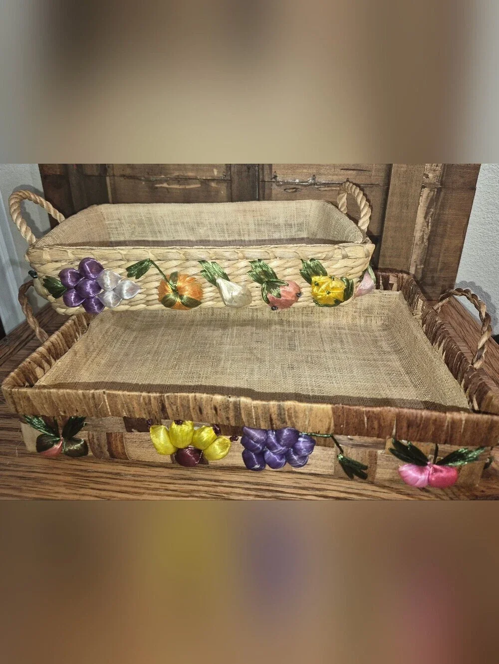 2 Vintage Raffia Woven Casserole Carriers decorated w/colorful embroidered fruit